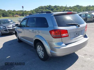 2018 Dodge Journey SE z VIN 3C4PDCAB8JT344720, wystawiony jako IAAI lot #40491703 z przebiegiem 86 601 mil mil oraz . Historia ofert i sprzedaży dostępna na DreamBid. Obrazek 3.