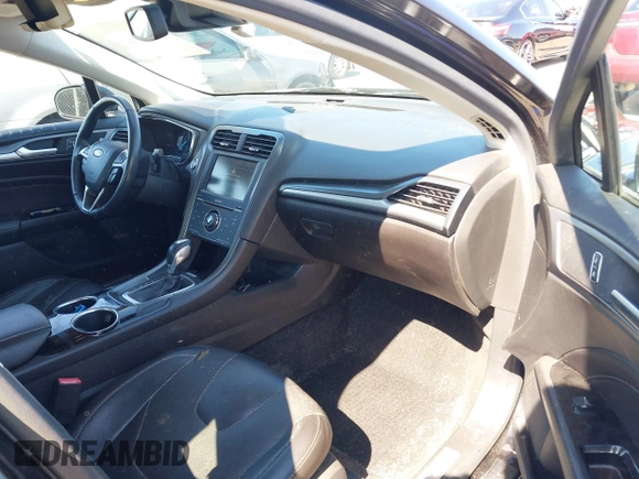 2013 Ford Fusion Titanium Hybrid with VIN 3FA6P0RU2DR288773, listed as a IAAI auction lot 41803708 with 85,868 mi miles and . Bid and sale history available at DreamBid. Image 5.