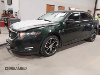 2013 Ford Taurus SHO z VIN 1FAHP2KT8DG142620, wystawiony jako IAAI lot #41800583 z przebiegiem 175 812 mil mil oraz . Historia ofert i sprzedaży dostępna na DreamBid. Obrazek 2.