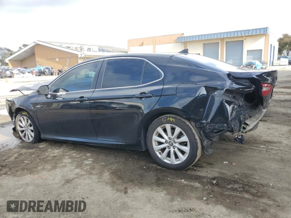 2020 Toyota Camry LE with VIN 4T1C11AK8LU916319, listed as a Copart auction lot 51277715 with 128,204 mi miles and Salvage Title. Bid and sale history available at carsss.com. Image 2.