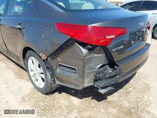 2013 Kia Optima LX with VIN 5XXGM4A74DG093454, listed as a IAAI auction lot 42004990 with 176,667 mi miles. Bid and sale history available at carsss.com. Image 6.