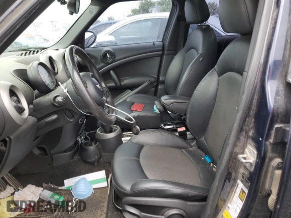 2011 MINI Countryman S with VIN WMWZC3C52BWM25644, listed as a Copart auction lot 58213835 with Not provided miles and Clean title. Bid and sale history available at DreamBid. Image 7.