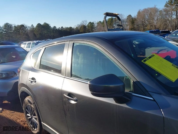 2019 Mazda CX-5 Touring with VIN JM3KFACM0K0668242, listed as a IAAI auction lot 41308376 with NaN miles. Bid and sale history available at carsss.com. Image 13.