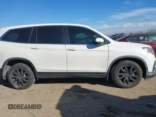 2019 Honda Pilot EX-L with VIN 5FNYF5H59KB017415, listed as a IAAI auction lot 41340852 with 125,433 mi miles and . Bid and sale history available at DreamBid. Image 14.