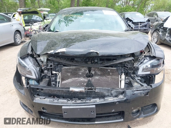 2013 Nissan Maxima SV z VIN 1N4AA5AP3DC844165, wystawiony jako IAAI lot #42244988 z przebiegiem 105 937 mil mil oraz . Historia ofert i sprzedaży dostępna na DreamBid. Obrazek 12.