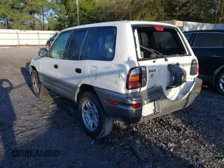 2000 Toyota RAV4 with VIN JT3GP10V9Y0046468, listed as a IAAI auction lot 41864553 with 286,660 mi miles and . Bid and sale history available at DreamBid. Image 3.