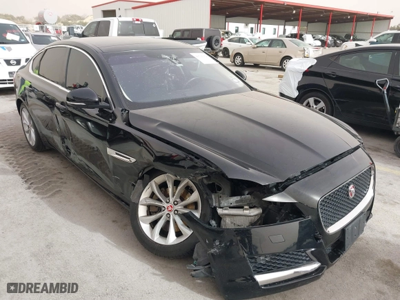 2019 Jaguar XF 25t Premium with VIN SAJBD4FX4KCY79210, listed as a IAAI auction lot 41716178 with 76,314 mi miles. Bid and sale history available at carsss.com. Image 6.