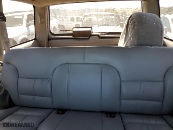 1999 Chevrolet Tahoe with VIN 3GNEK18R5XG184695, listed as a Copart auction lot 67697224 with 135,316 mi miles and Salvage Title. Bid and sale history available at carsss.com. Image 10.