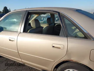 2000 Toyota Avalon XL with VIN 4T1BF28B2YU062203, listed as a IAAI auction lot 41230618 with 268,492 mi miles and . Bid and sale history available at DreamBid. Image 6.