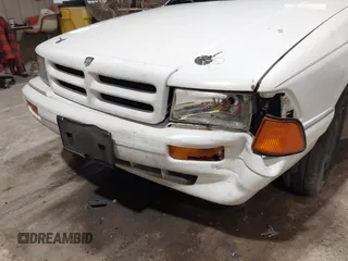 1994 Dodge Spirit z VIN 3B3AA46KXRT214299, wystawiony jako IAAI lot #41908262 z przebiegiem 72 619 mil mil oraz . Historia ofert i sprzedaży dostępna na DreamBid. Obrazek 6.