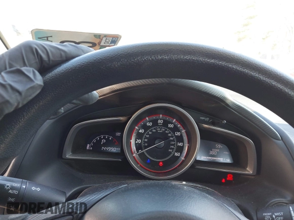 2016 Mazda Mazda3 i Sport with VIN 3MZBM1U72GM297738, listed as a IAAI auction lot 41779740 with 144,990 mi miles. Bid and sale history available at carsss.com. Image 7.