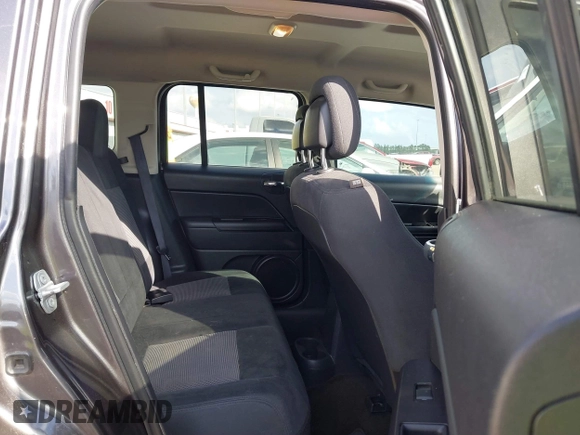 2015 Jeep Patriot Sport with VIN 1C4NJPBB9FD149731, listed as a IAAI auction lot 41490590 with 142,531 mi miles and . Bid and sale history available at carsss.com. Image 8.