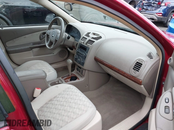 2005 Chevrolet Malibu Maxx LS z VIN 1G1ZT62865F282288, wystawiony jako IAAI lot #41502455 z przebiegiem 116 849 mil mil oraz . Historia ofert i sprzedaży dostępna na DreamBid. Obrazek 5.