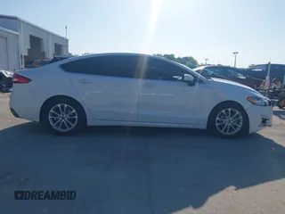 2019 Ford Fusion SE with VIN 3FA6P0HD1KR217840, listed as a IAAI auction lot 42011309 with 85,945 mi miles and . Bid and sale history available at carsss.com. Image 13.