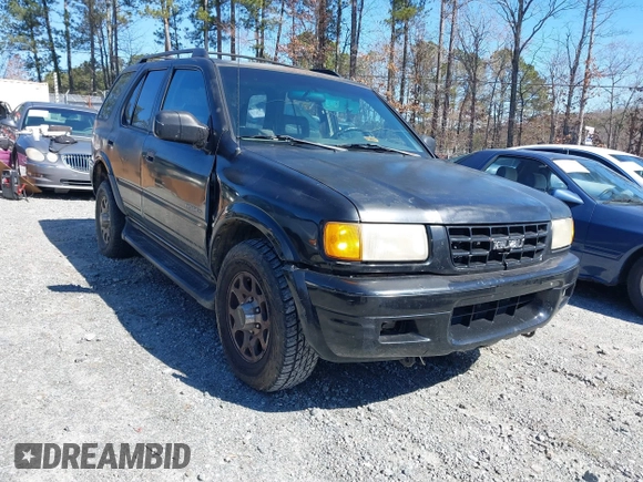 1998 Isuzu Rodeo S z VIN 4S2CK58W2W4315935, wystawiony jako IAAI lot #41593711 z przebiegiem 162 065 mil mil oraz . Historia ofert i sprzedaży dostępna na DreamBid. Obrazek 1.