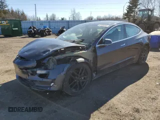 2019 Tesla Model 3 Long Range with VIN 5YJ3E1EB8KF452023, listed as a Copart auction lot 47389285 with 123,488 mi miles and Salvage Title. Bid and sale history available at carsss.com. Image 1.