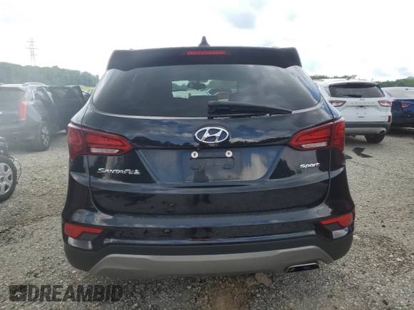 2018 Hyundai Santa Fe 2.4L with VIN 5NMZU3LBXJH066406, listed as a Copart auction lot 61388005 with 65,650 mi miles and Salvage title. Bid and sale history available at DreamBid. Image 6.