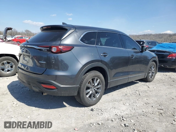 2021 Mazda CX-9 Touring z VIN JM3TCACY5M0500924, wystawiony jako Copart lot #50654505 z przebiegiem 57 067 mil mil oraz Szkoda całkowita • Salvage title. Historia ofert i sprzedaży dostępna na DreamBid. Obrazek 3.