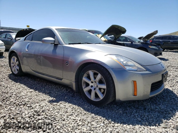 2004 Nissan 350Z Enthusiast with VIN JN1AZ34D84M100633, listed as a Copart auction lot 61036114 with 36,810 mi miles and Salvage Title. Bid and sale history available at DreamBid. Image 4.