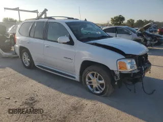 2006 GMC Envoy Denali with VIN 1GKET63M662228794, listed as a Copart auction lot 70802804 with 134,323 mi miles and Salvage Title. Bid and sale history available at DreamBid. Image 4.