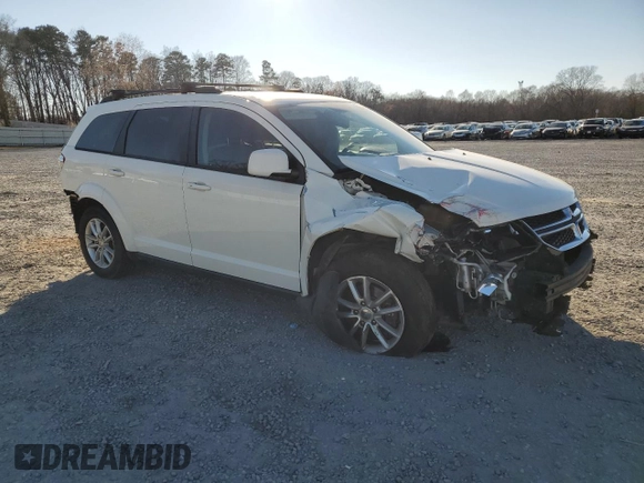 2013 Dodge Journey SXT with VIN 3C4PDCBG7DT689297, listed as a Copart auction lot 47303385 with 129,120 mi miles and Salvage Title. Bid and sale history available at carsss.com. Image 4.