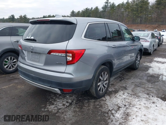 2021 Honda Pilot EX-L with VIN 5FNYF6H57MB010259, listed as a IAAI auction lot 41307012 with 57,849 mi miles. Bid and sale history available at carsss.com. Image 4.