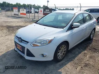 2012 Ford Focus SE with VIN 1FAHP3F21CL192126, listed as a IAAI auction lot 42598631 with 125,741 mi miles and . Bid and sale history available at DreamBid. Image 2.