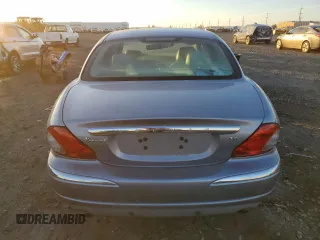 2007 Jaguar X-Type z VIN SAJWA51A27WJ21259, wystawiony jako Copart lot #42643115 z przebiegiem 106 800 mil mil oraz Szkody całkowita. Historia ofert i sprzedaży dostępna na DreamBid. Obrazek 6.