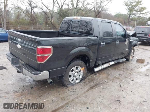 2011 Ford F-150 XLT with VIN 1FTFW1CT5BFB13799, listed as a IAAI auction lot 41426609 with 200,000 mi miles. Bid and sale history available at carsss.com. Image 4.