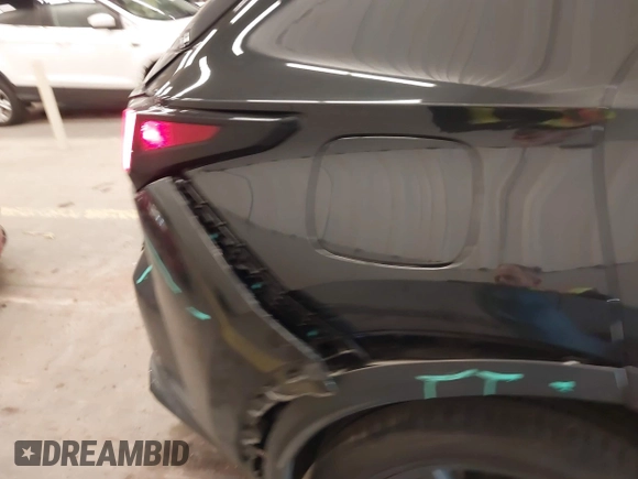 2022 Lexus NX 450h+ Luxury z VIN JTJHKCFZ7N2003572, wystawiony jako IAAI lot #42101154 z przebiegiem 34 455 mil mil oraz . Historia ofert i sprzedaży dostępna na DreamBid. Obrazek 17.