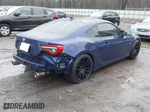 2017 Toyota 86 with VIN JF1ZNAA12H9703408, listed as a IAAI auction lot 41311374 with 90,661 mi miles. Bid and sale history available at carsss.com. Image 4.