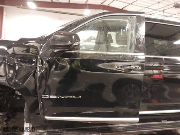 2021 GMC Yukon XL Denali with VIN 1GKS2JKL3MR149850, listed as a IAAI auction lot 41588274 with 77,181 mi miles. Bid and sale history available at carsss.com. Image 21.