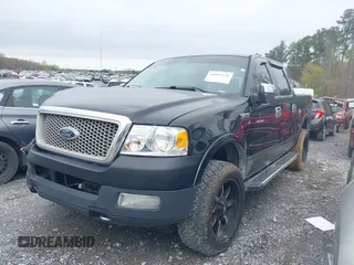 2005 Ford F-150 XLT with VIN 1FTPW14505FA88819, listed as a IAAI auction lot 41853524 with 227,414 mi miles. Bid and sale history available at carsss.com. Image 2.