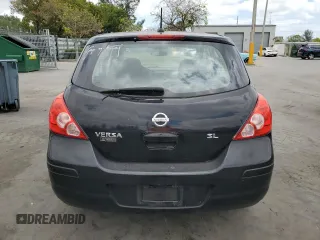 2009 Nissan Versa S with VIN 3N1BC13E99L418721, listed as a Copart auction lot 54268065 with 196,206 mi miles and Clean Title. Bid and sale history available at DreamBid. Image 6.