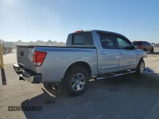 2015 Nissan Titan SV z VIN 1N6BA0ED7FN506693, wystawiony jako Copart lot #72467303 z przebiegiem 46 260 mil mil oraz Szkoda całkowita • Salvage title. Historia ofert i sprzedaży dostępna na DreamBid. Obrazek 3.