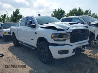 2023 Ram 2500 Laramie with VIN 3C6UR5FL3PG517960, listed as a IAAI auction lot 42128355 with 101,733 mi miles and . Bid and sale history available at DreamBid. Image 1.