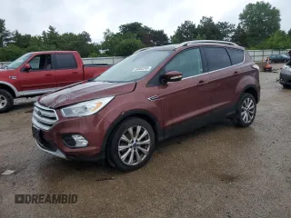 2018 Ford Escape Titanium with VIN 1FMCU0J93JUA70449, listed as a Copart auction lot 59303245 with 165,907 mi miles and Salvage title. Bid and sale history available at DreamBid. Image 1.