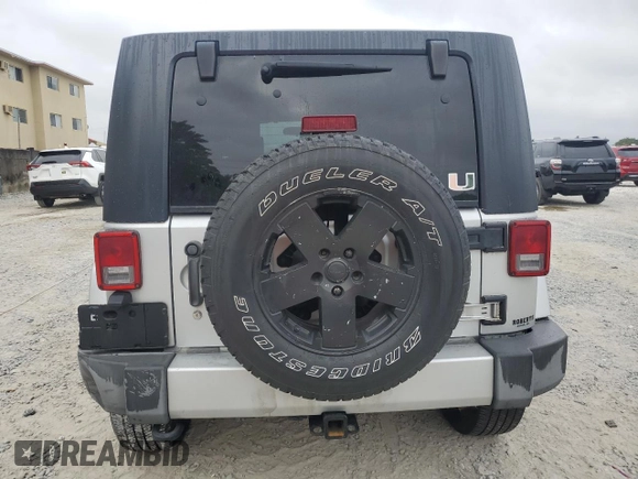 2010 Jeep Wrangler Unlimited Sahara with VIN 1J4BA5H17AL117410, listed as a Copart auction lot 88519555 with 126,471 mi miles and Salvage Title. Bid and sale history available at carsss.com. Image 6.
