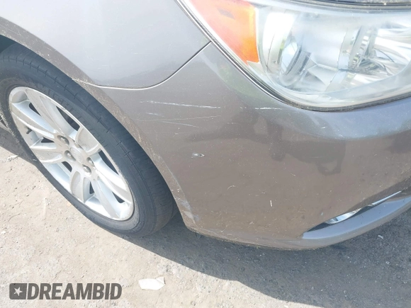 2012 Buick LaCrosse Premium 1 with VIN 1G4GE5E30CF268477, listed as a IAAI auction lot 42360737 with 44,860 mi miles and . Bid and sale history available at DreamBid. Image 6.