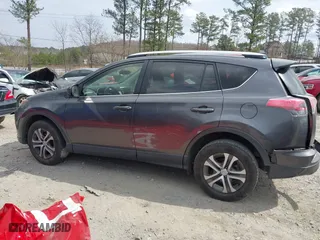2016 Toyota RAV4 LE with VIN JTMZFREV2GJ092537, listed as a IAAI auction lot 41794148 with 145,678 mi miles. Bid and sale history available at carsss.com. Image 14.