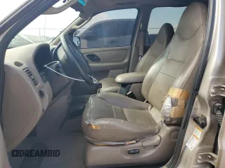 2001 Ford Escape XLT with VIN 1FMCU03131KB27591, listed as a Copart auction lot 66605904 with 167,094 mi miles and Salvage Title. Bid and sale history available at carsss.com. Image 7.