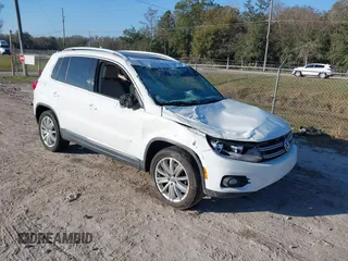 2015 Volkswagen Tiguan SE with VIN WVGAV7AX5FW600170, listed as a IAAI auction lot 41460660 with Not provided miles and . Bid and sale history available at DreamBid. Image 1.