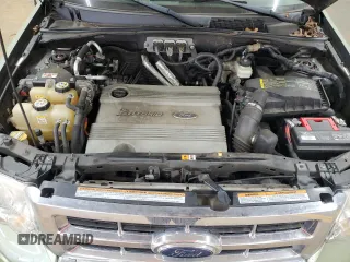 2008 Ford Escape Hybrid z VIN 1FMCU59H88KE28689, wystawiony jako Copart lot #50769085 z przebiegiem 217 681 mil mil oraz Czysty tytuł • Clean title. Historia ofert i sprzedaży dostępna na DreamBid. Obrazek 12.