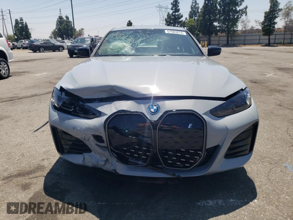2024 BMW i4 eDrive35 with VIN WBY43AW06RFS94891, listed as a Copart auction lot 57983274 with 1,099 mi miles and Salvage Title. Bid and sale history available at carsss.com. Image 5.