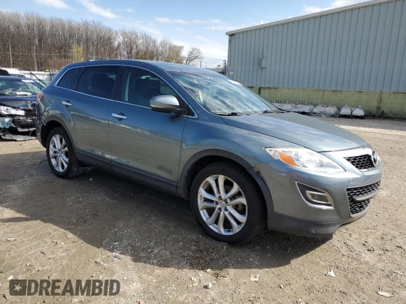 2012 Mazda CX-9 Grand Touring with VIN JM3TB3DV4C0364223, listed as a Copart auction lot 49413805 with 103,257 mi miles and Salvage Title. Bid and sale history available at DreamBid. Image 4.