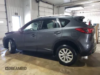 2014 Mazda CX-5 Touring with VIN JM3KE4CY6E0306508, listed as a Copart auction lot 53475075 with 0 mi miles and Salvage Title. Bid and sale history available at carsss.com. Image 2.