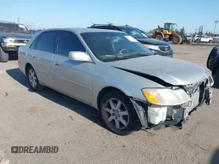 2002 Toyota Avalon XL z VIN 4T1BF28BX2U202456, wystawiony jako IAAI lot #42359830 z przebiegiem 205 336 mil mil oraz . Historia ofert i sprzedaży dostępna na DreamBid. Obrazek 1.