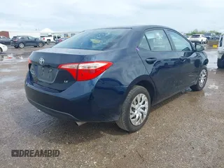 2019 Toyota Corolla L with VIN 5YFBURHE5KP874211, listed as a IAAI auction lot 41904269 with 109,217 mi miles. Bid and sale history available at carsss.com. Image 4.