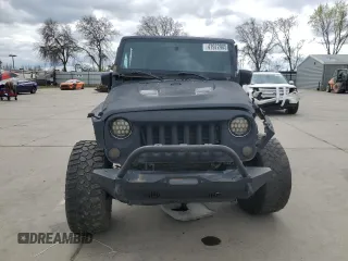 2015 Jeep Wrangler Unlimited Wrangler X with VIN 1C4HJWEG7FL649231, listed as a Copart auction lot 47972905 with 133,895 mi miles and Salvage title. Bid and sale history available at DreamBid. Image 5.