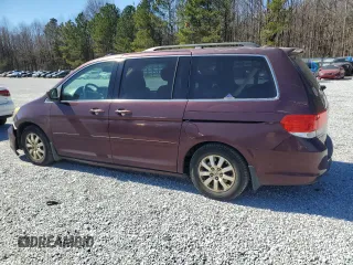 2010 Honda Odyssey EX-L with VIN 5FNRL3H6XAB082296, listed as a Copart auction lot 46933825 with 196,541 mi miles and Salvage Title. Bid and sale history available at carsss.com. Image 2.